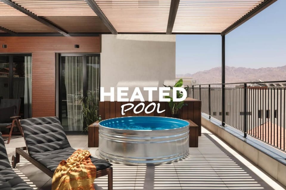 Patio, Day, Natural landscape, Hot Tub, View (from property/room), Balcony/Terrace, Text overlay, Pool view, Swimming pool, sunbed