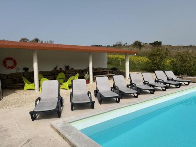 Swimming pool, sunbed