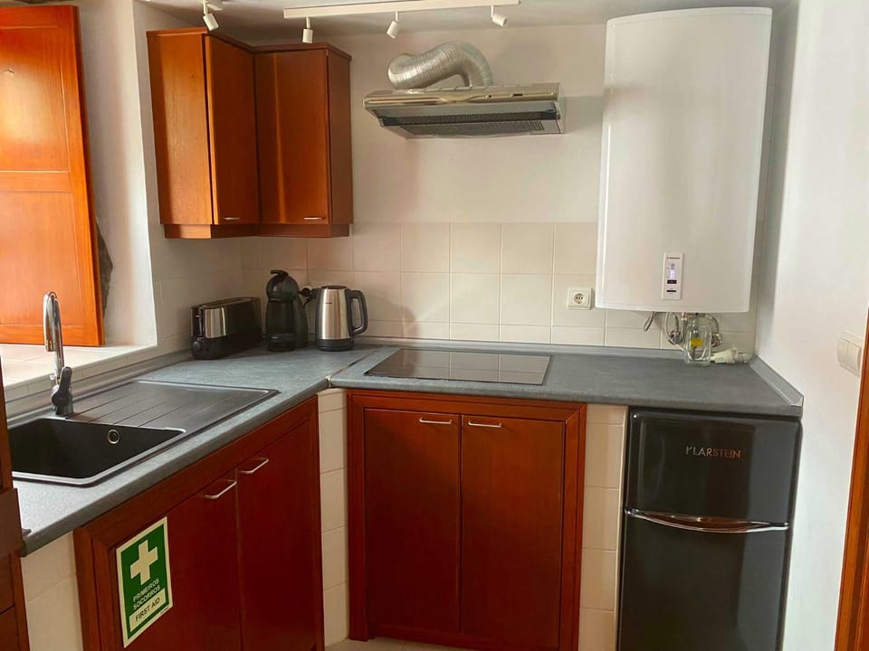 Kitchen or kitchenette, stove, kitchen