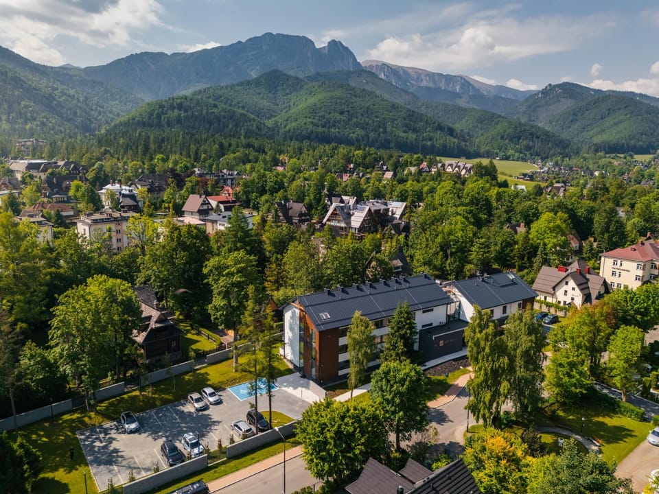 Property building, Spring, Day, Neighbourhood, Natural landscape, Bird's eye view, Mountain view