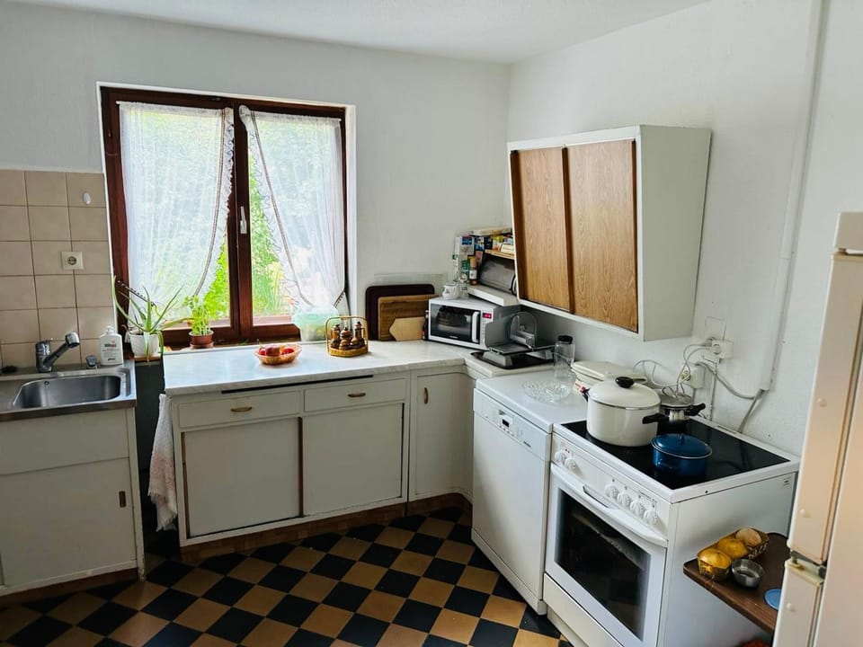 Kitchen or kitchenette, stove, toaster
