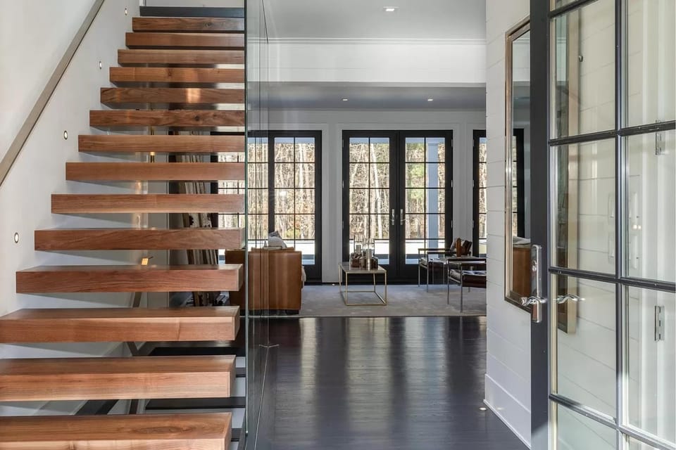 View (from property/room), Living room, Decorative detail, Seating area, Garden view, Pool view