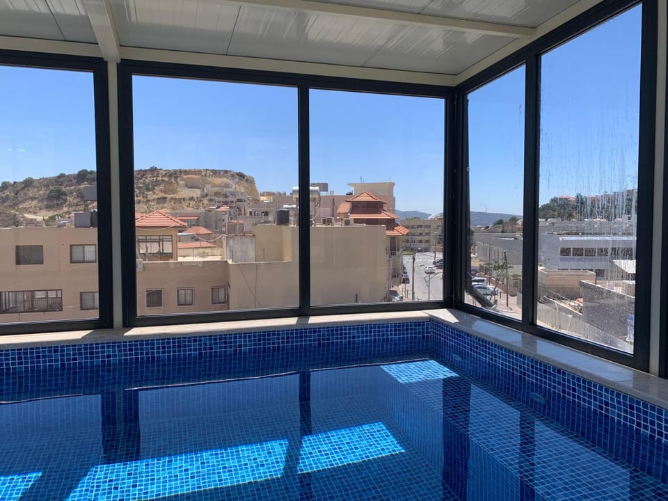 City view, Street view, Swimming pool, Swimming pool, Sunset