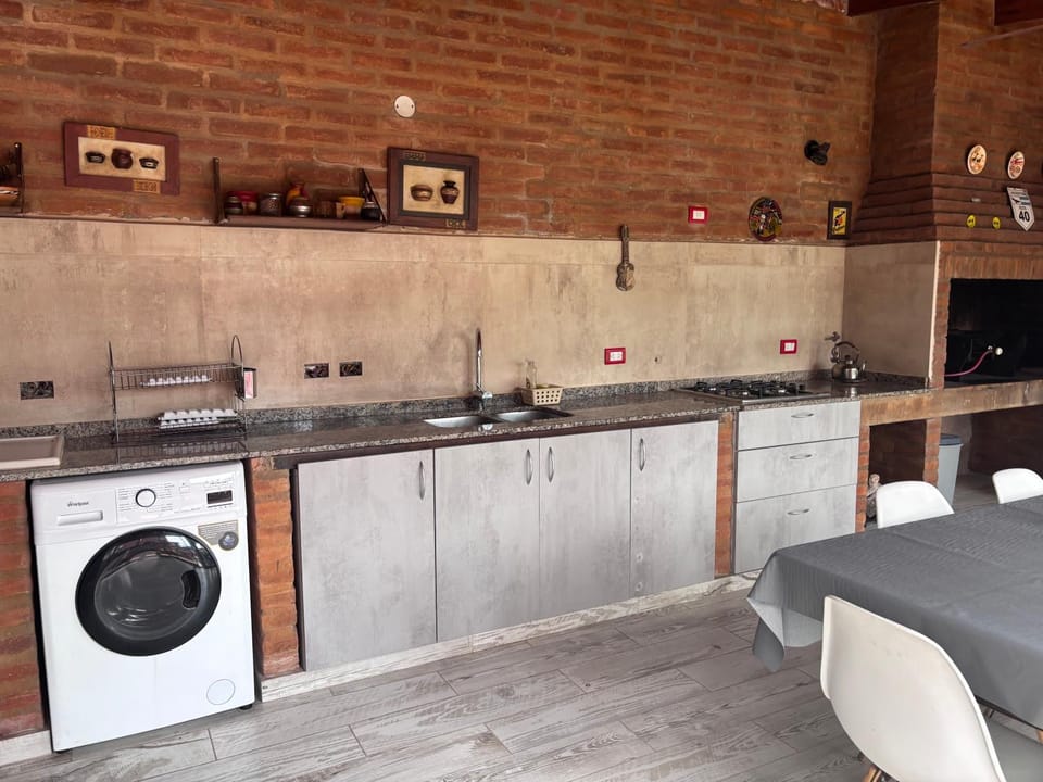Kitchen or kitchenette, stove, washing machine