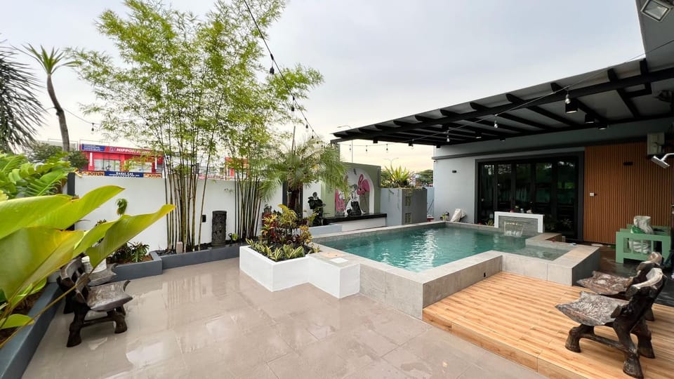 Natural landscape, Garden, Living room, Seating area, Garden view, Pool view