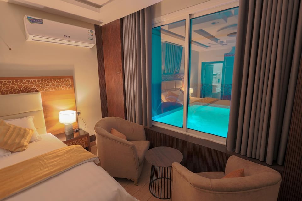 Bed, Photo of the whole room, Bedroom, Pool view, air conditioner