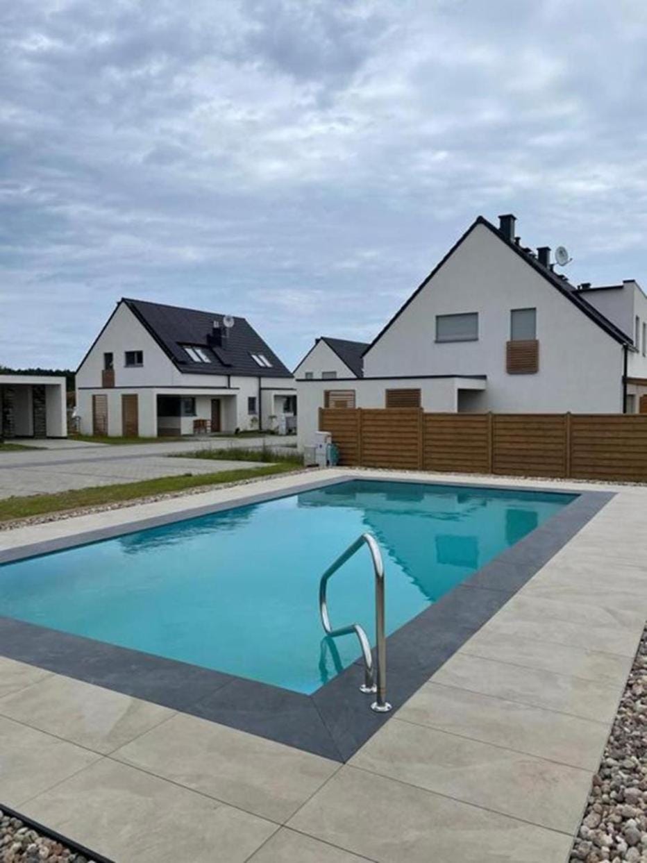 Ferienhaus Lilja mit Grill Kamin eignes großes Grundstück und Außenpool House in West Pomeranian Voivodeship, Poland
