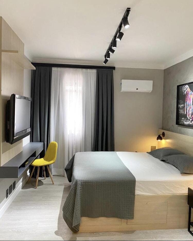 Studio moderno - Jardins: Cama Queen, Ar e Garagem Apartment in Sao Paulo City