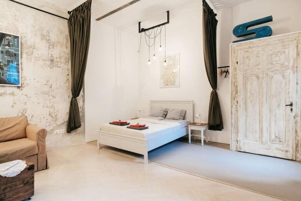 Bed, Living room, Seating area, towels, wardrobe