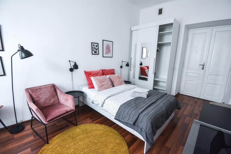 Facade/entrance, Bed, Living room, Decorative detail, Decorative detail, Seating area, Bedroom, hair dresser, microwave, wardrobe