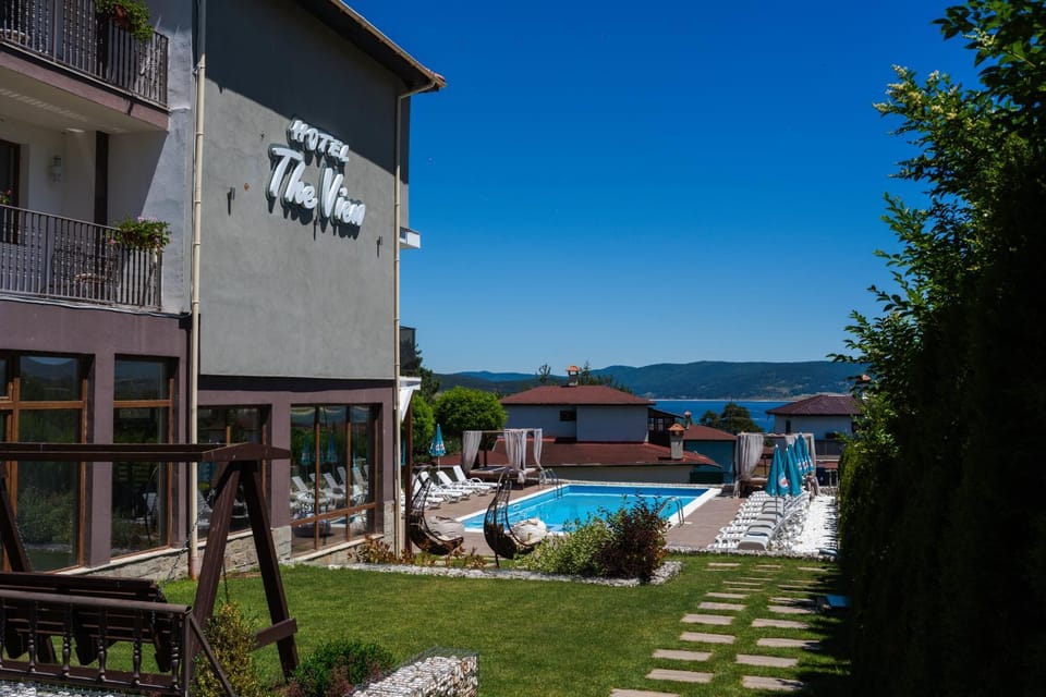 Property building, Natural landscape, Sea view, Swimming pool, sunbed