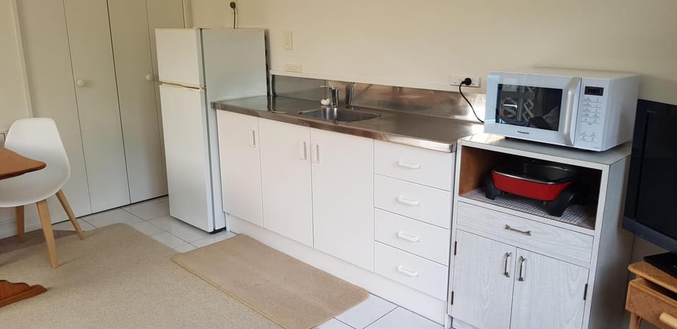 Kitchen or kitchenette, microwave