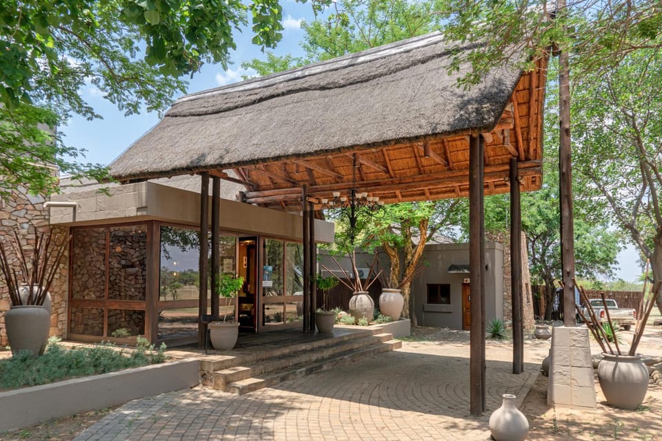 Property building, Patio, Facade/entrance, Spring, Natural landscape