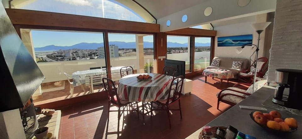 Living room, Seating area, Dining area, Mountain view, Pool view, Sea view