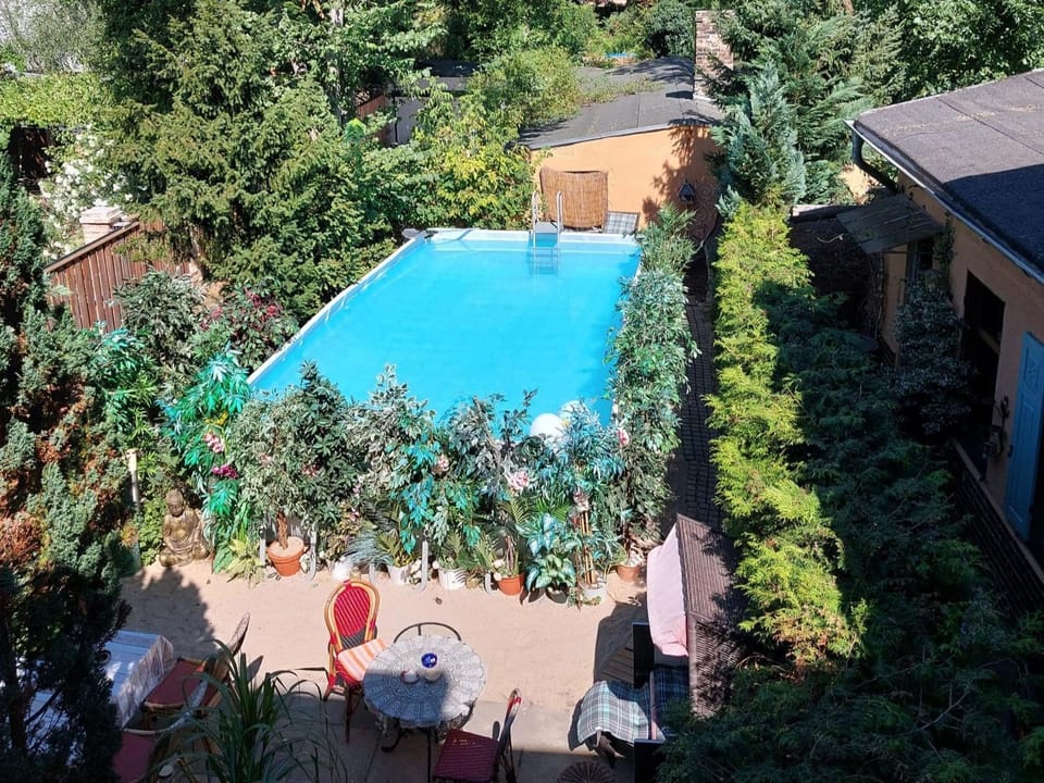 Property building, Living room, Swimming pool