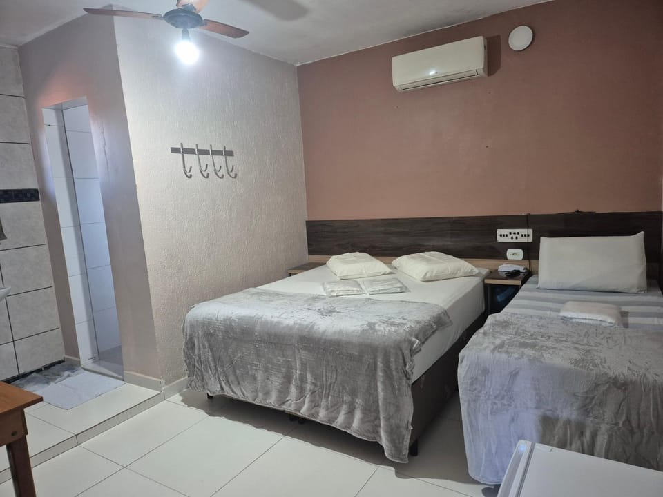 Bed, Photo of the whole room, towels, air conditioner