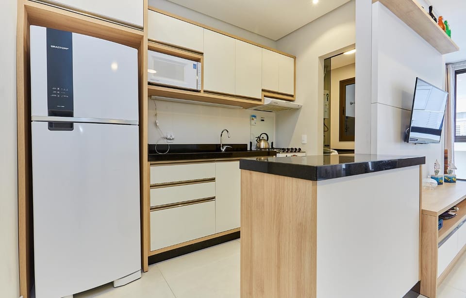 1086 Apartamento novo com 02 vagas de garagem À 100 metros da praia do centro de Bombinhas Apartment in Bombinhas