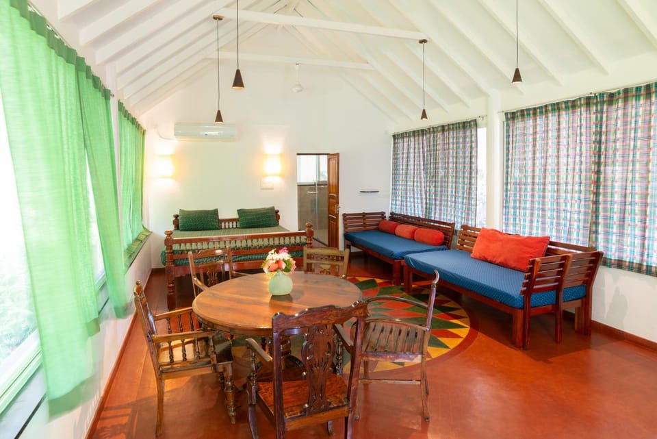 Bed, Living room, Seating area, Bedroom