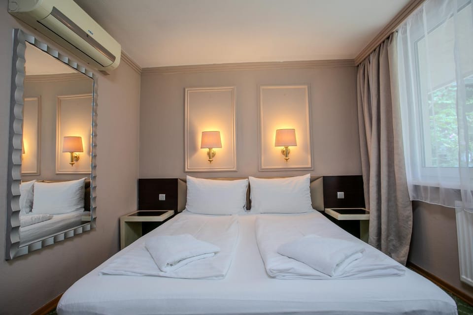 Bed, Photo of the whole room, Bedroom, Garden view, towels, air conditioner