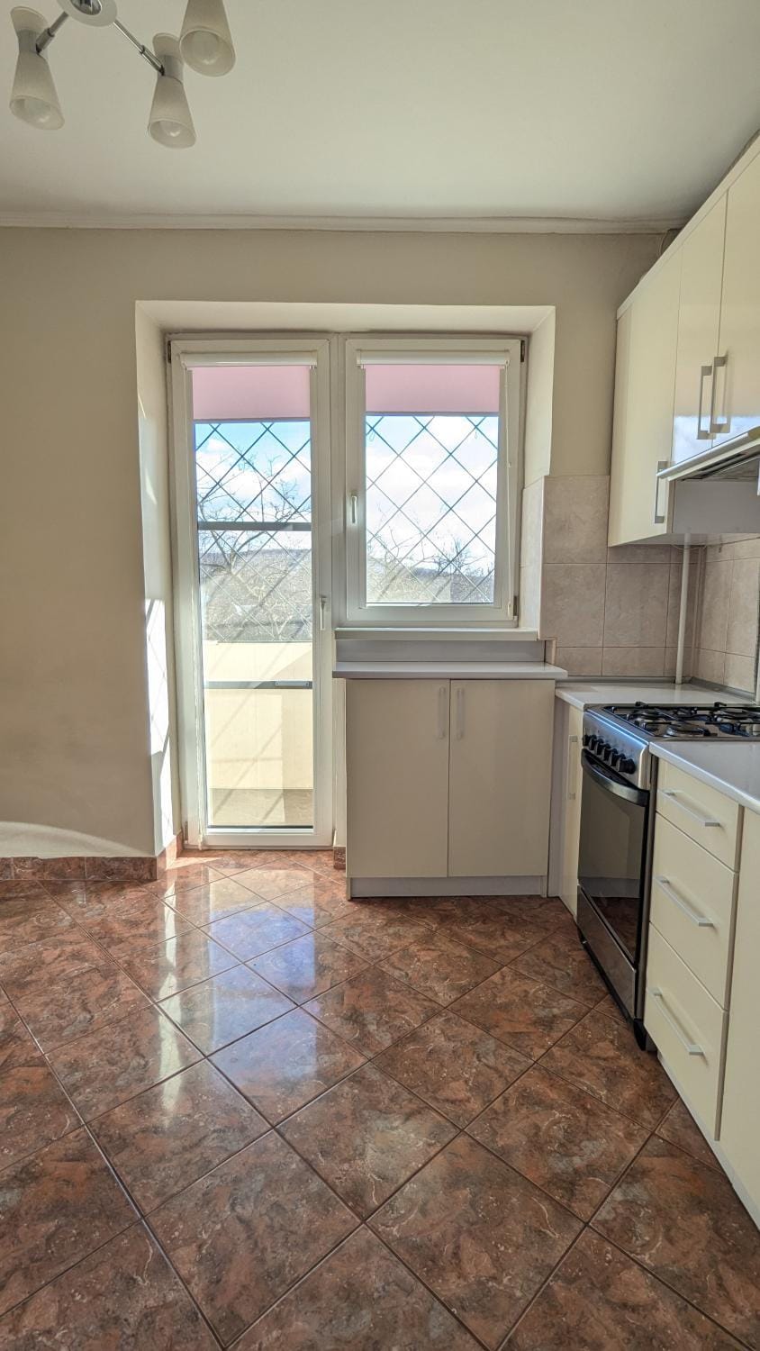 Kitchen or kitchenette, oven, stove
