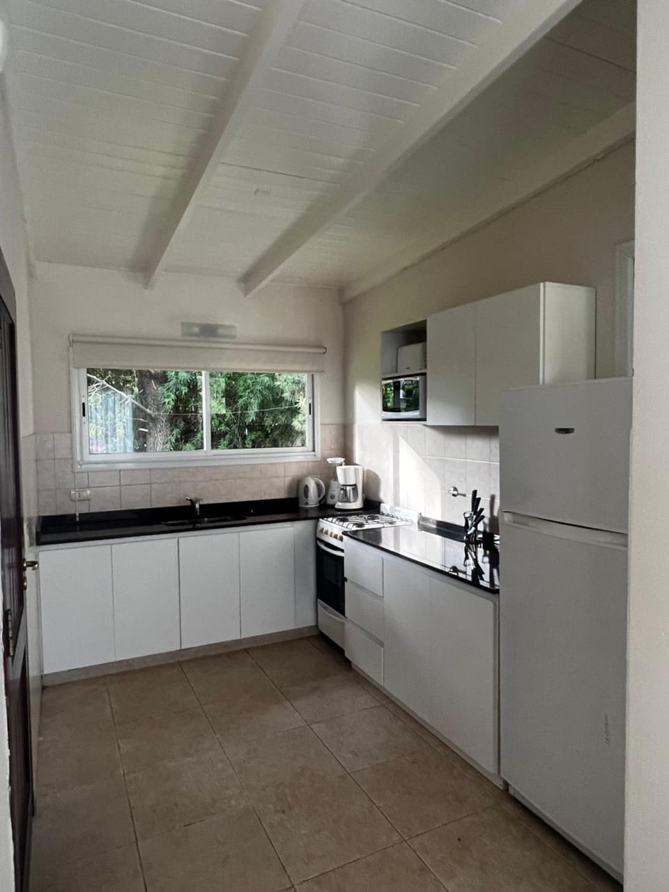 Kitchen or kitchenette, oven, stove