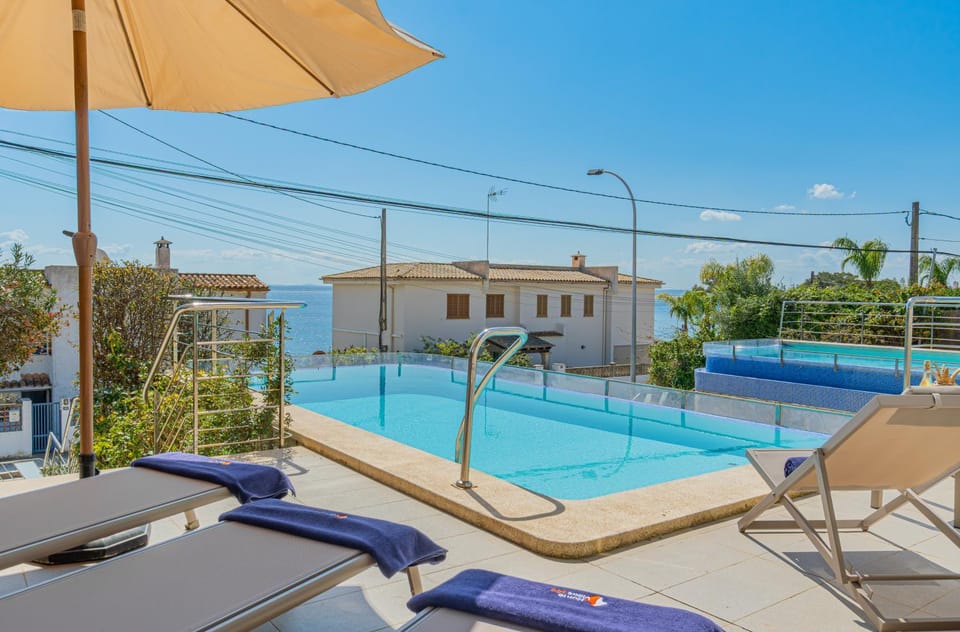 Patio, Day, Natural landscape, Pool view, Swimming pool, sunbed