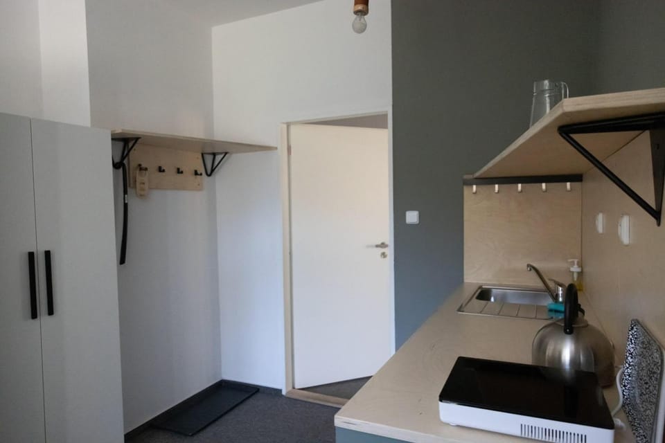 Kitchen or kitchenette, stove