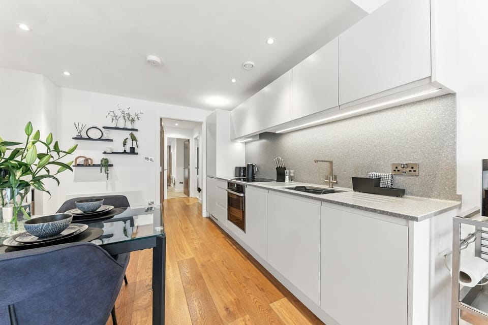 Kitchen or kitchenette, dishwasher, oven, stove, toaster