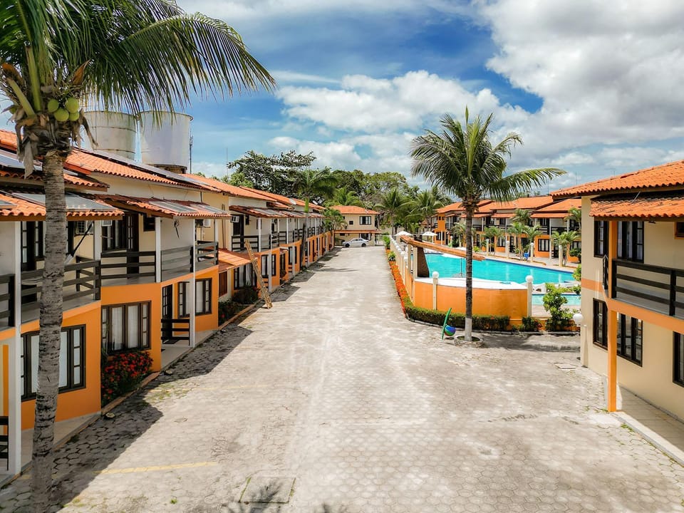Property building, Day, Pool view, Swimming pool, sunbed