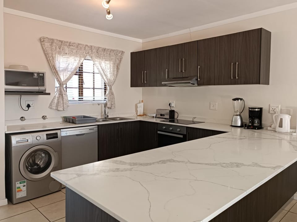 dishwasher, pet friendly, stove, toaster, toaster, toaster, washing machine, washing machine, kitchen, kitchen