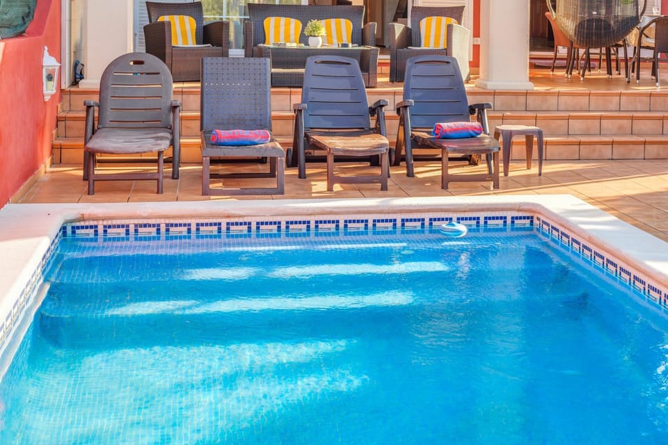 Property building, Living room, Swimming pool