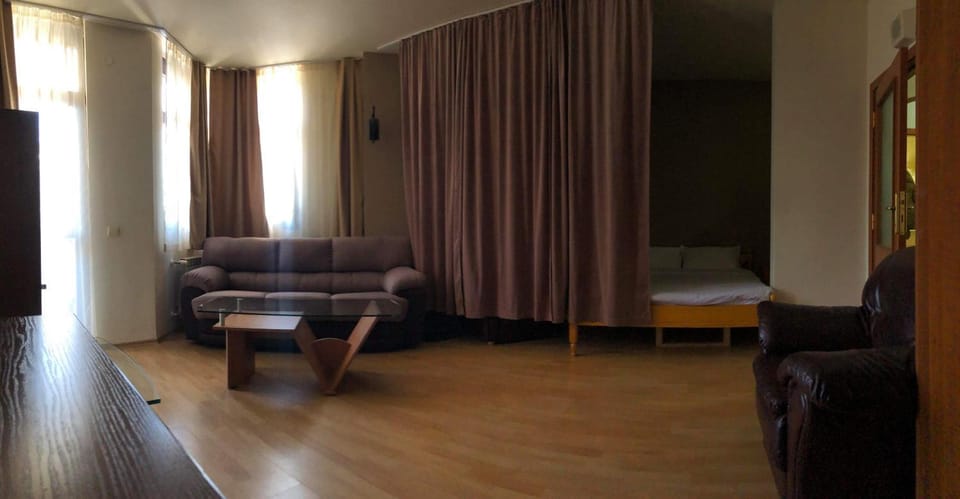 Bed, Living room, Seating area