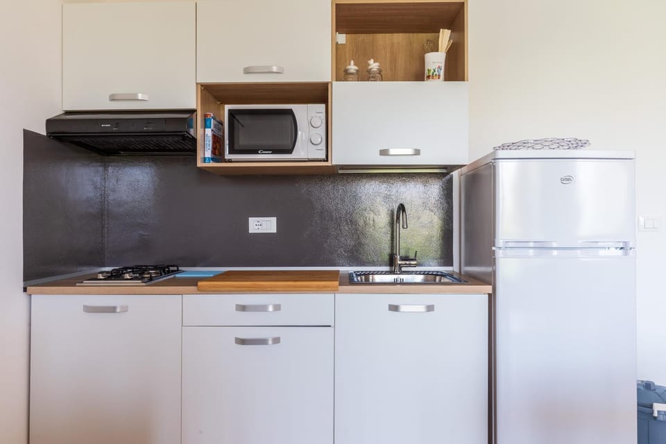 Kitchen or kitchenette, stove