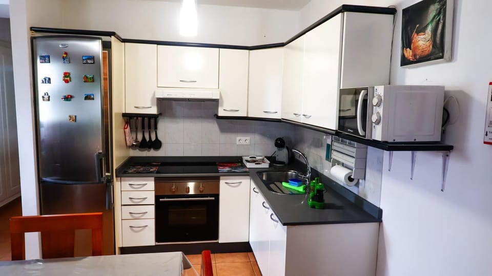 Kitchen or kitchenette, oven, stove