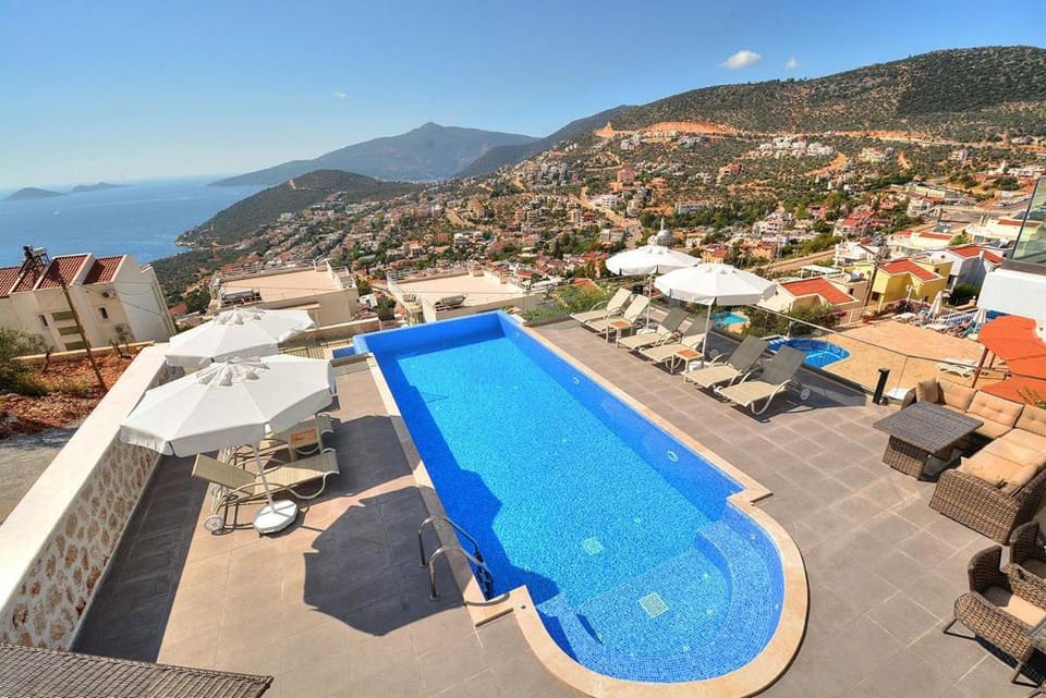 Nearby landmark, Day, Natural landscape, Mountain view, Pool view, Sea view, Swimming pool, sunbed