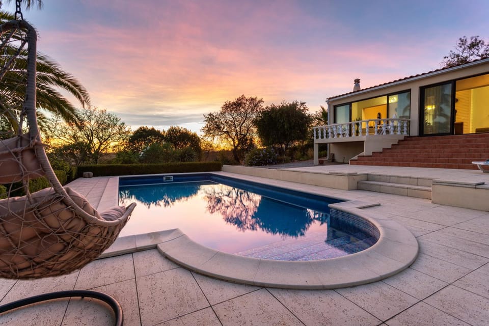 Property building, Swimming pool, Sunset