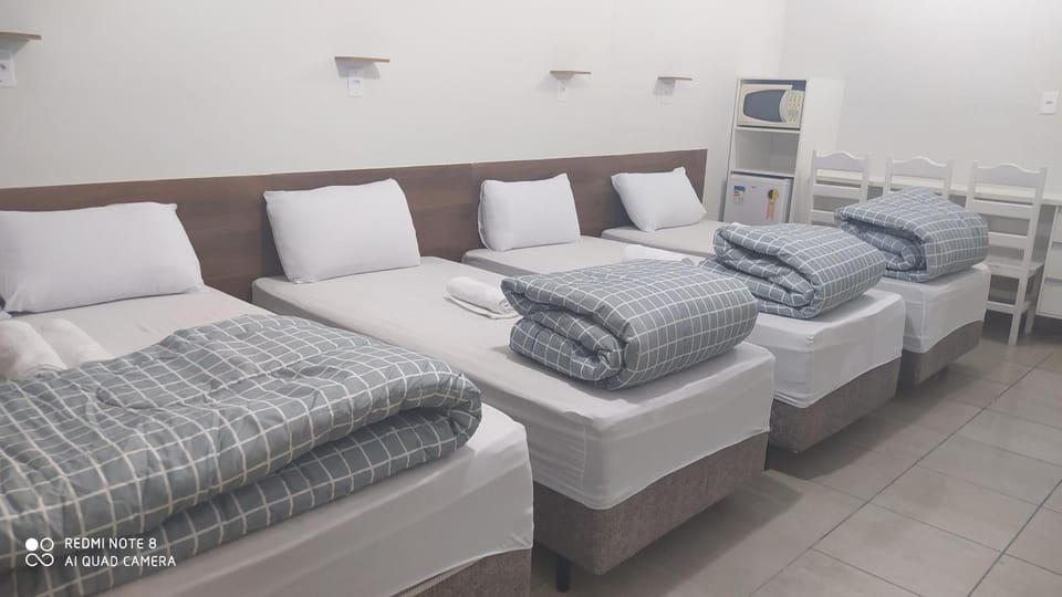Pousada Quarto Suíte Famíliar com ar,frigobar, wi fi e garagem Vacation rental in State of São Paulo