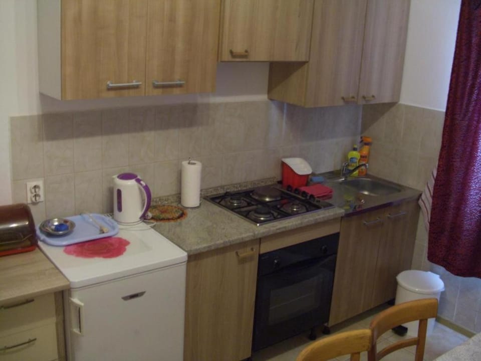 Kitchen or kitchenette, stove