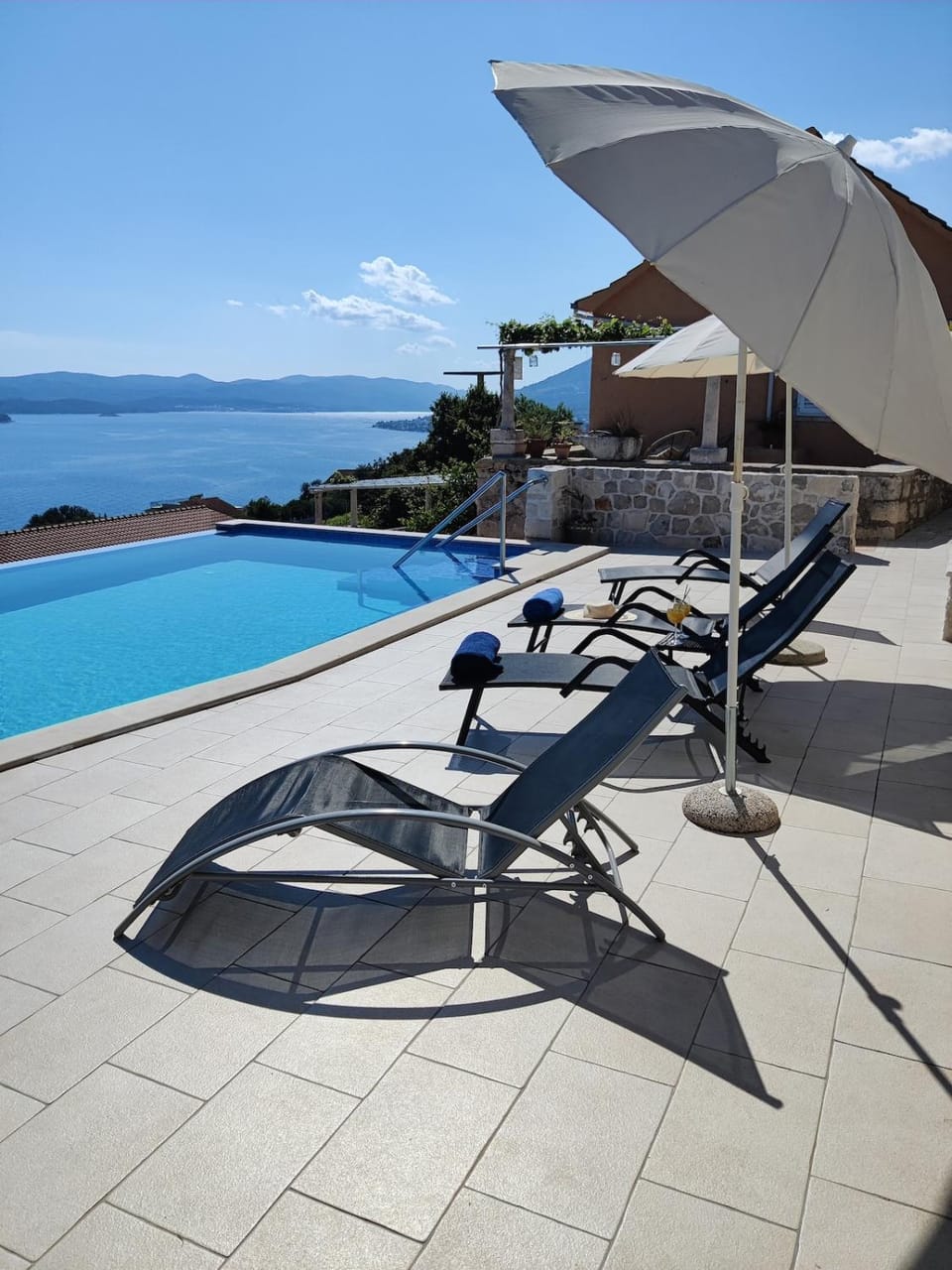 Patio, Pool view, Sea view, sunbed