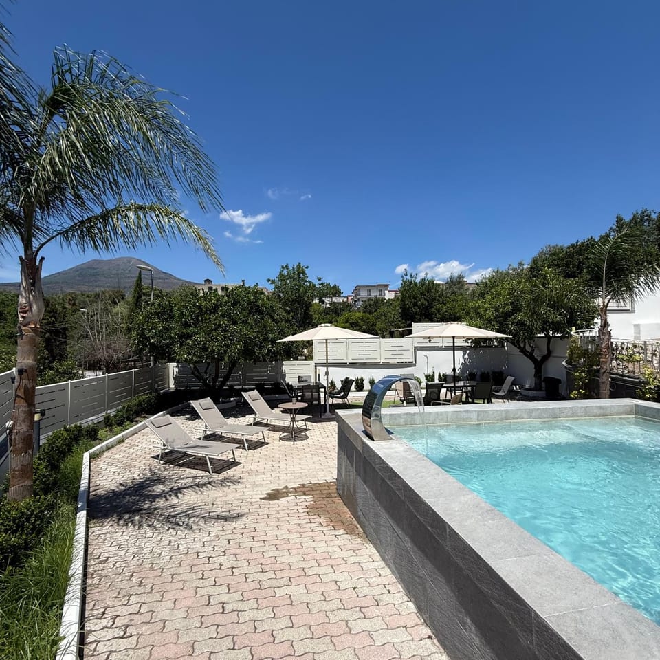Patio, Natural landscape, Garden, Swimming pool, sunbed