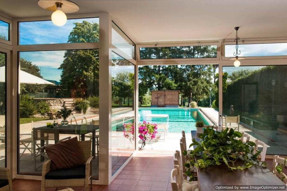 Patio, Day, Dining area, Pool view, Swimming pool