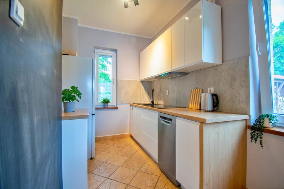 Kitchen or kitchenette, microwave, stove, toaster