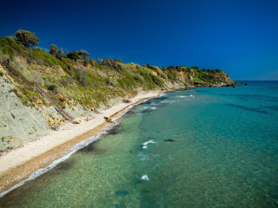 Property building, Nearby landmark, Natural landscape, Beach