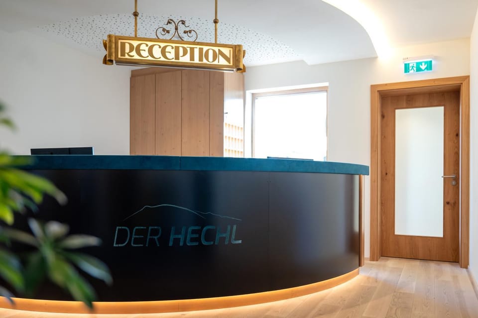 Day, Property logo or sign, Lobby or reception