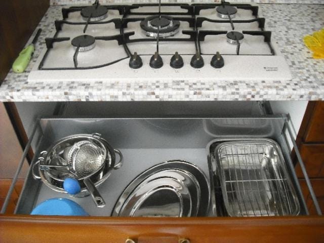 Kitchen or kitchenette, stove