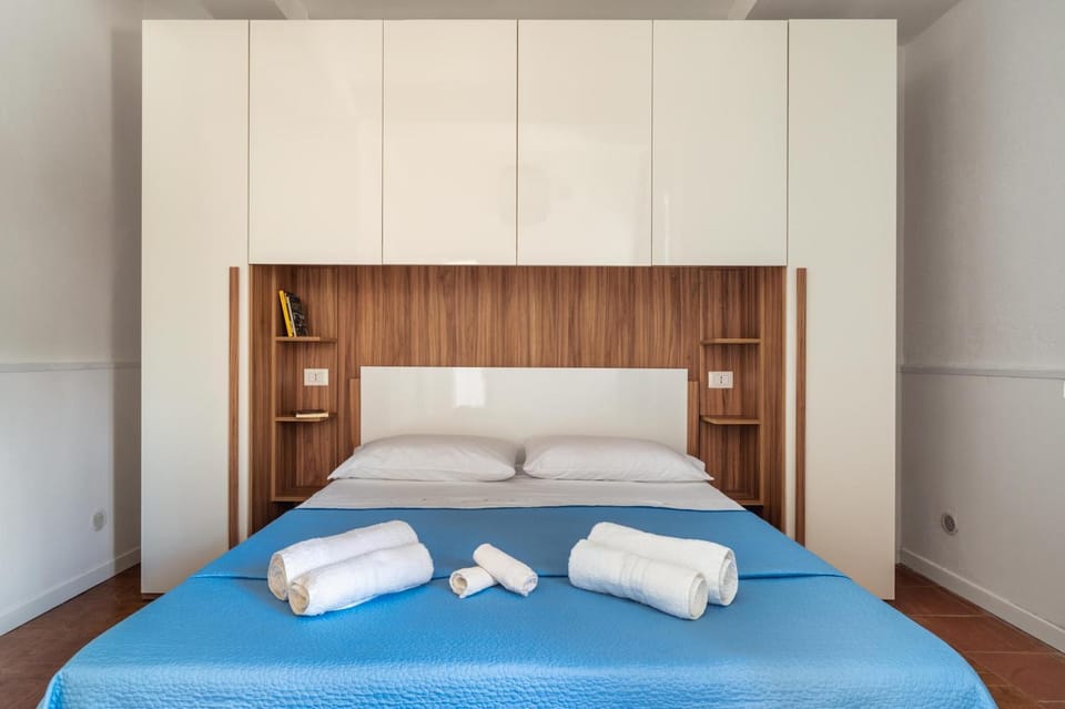 Bedroom, furniture, locker, towels, air conditioner