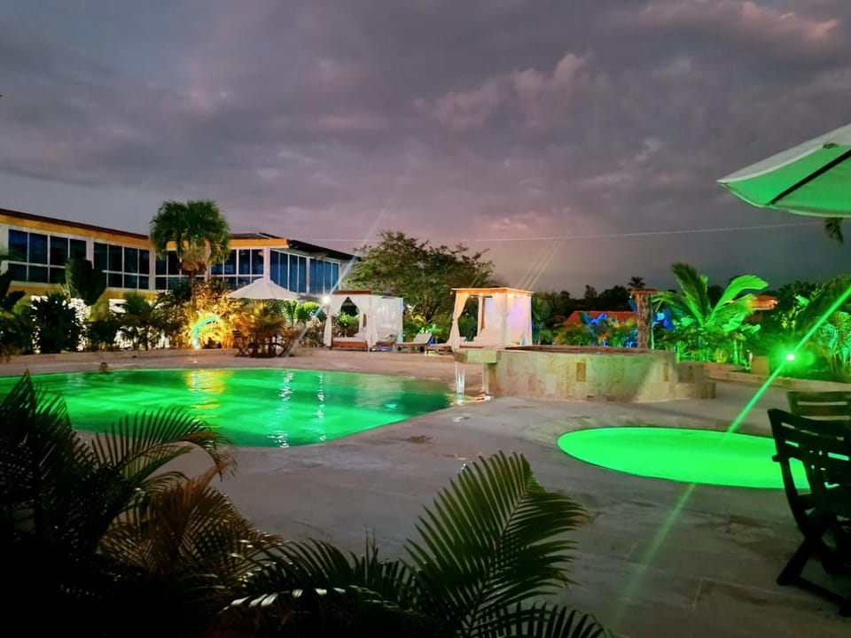 Property building, Night, Natural landscape, Swimming pool, sunbed