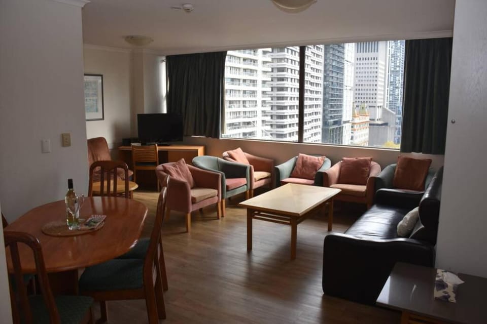 Property building, View (from property/room), Living room, Dining area, City view