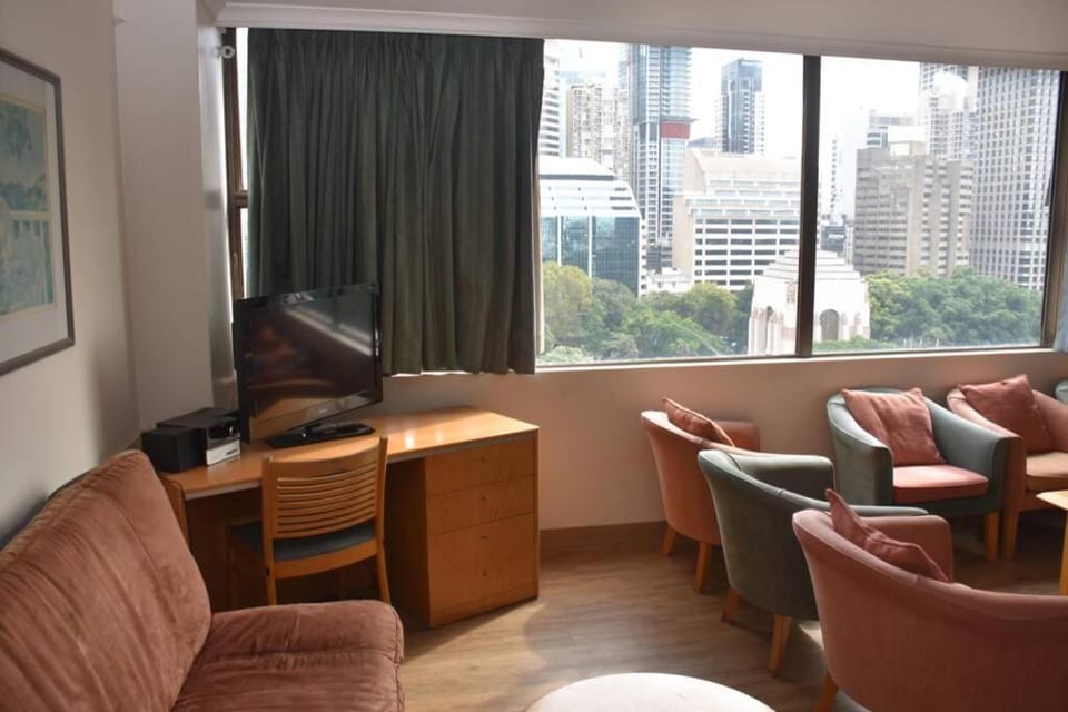 Property building, TV and multimedia, Living room, Seating area, Landmark view