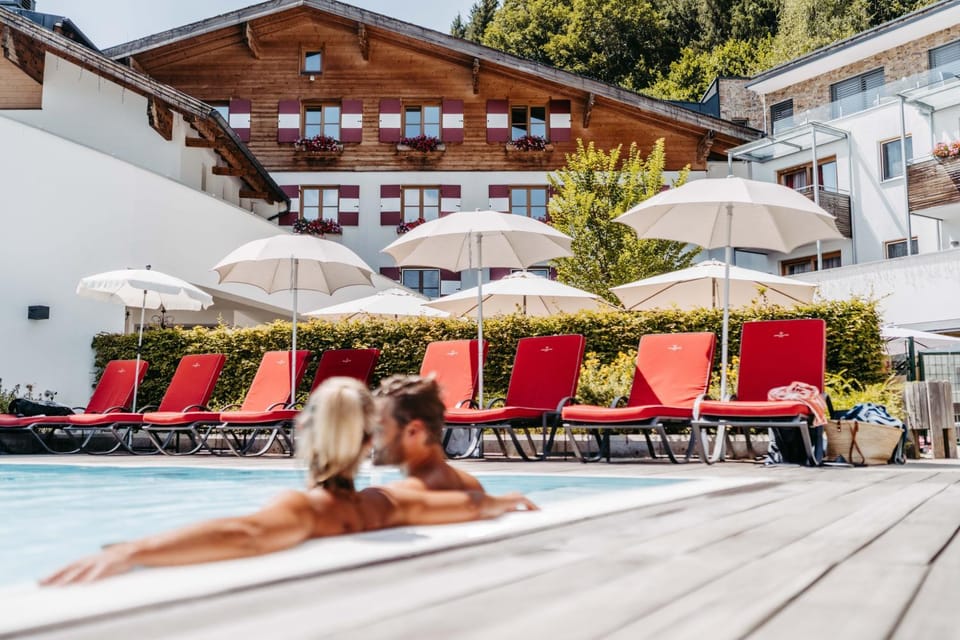 Property building, Patio, Pool view, Swimming pool, sunbed